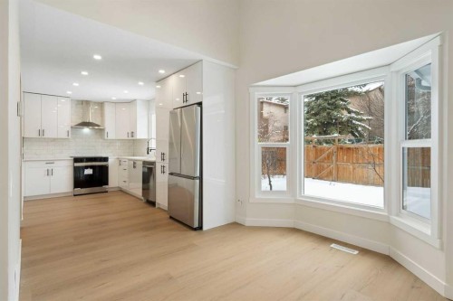 24 Hawkwood Crescent Nw, Calgary, AB - Indoor Photo Showing Kitchen With Stainless Steel Kitchen With Upgraded Kitchen
