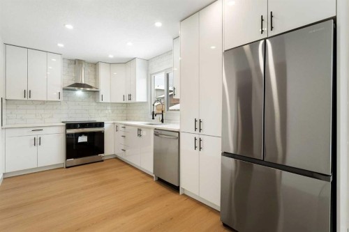 24 Hawkwood Crescent Nw, Calgary, AB - Indoor Photo Showing Kitchen With Stainless Steel Kitchen With Upgraded Kitchen