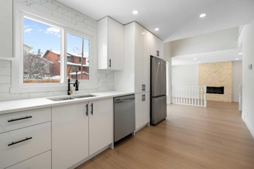 24 Hawkwood Crescent Nw, Calgary, AB - Indoor Photo Showing Kitchen With Stainless Steel Kitchen With Double Sink