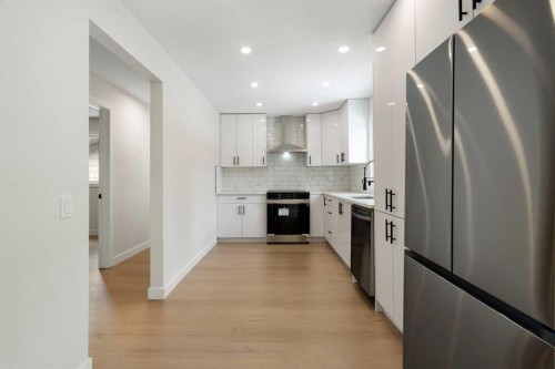 24 Hawkwood Crescent Nw, Calgary, AB - Indoor Photo Showing Kitchen With Stainless Steel Kitchen With Upgraded Kitchen