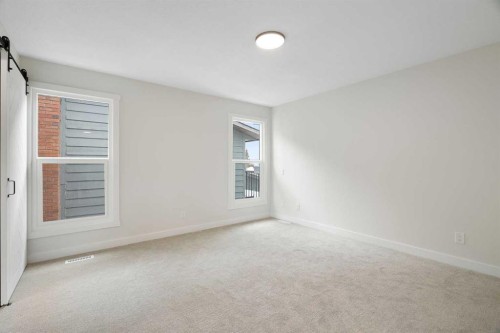 24 Hawkwood Crescent Nw, Calgary, AB - Indoor Photo Showing Other Room