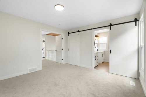 24 Hawkwood Crescent Nw, Calgary, AB - Indoor Photo Showing Other Room