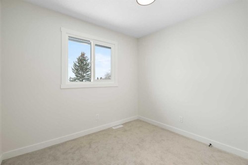 24 Hawkwood Crescent Nw, Calgary, AB - Indoor Photo Showing Other Room