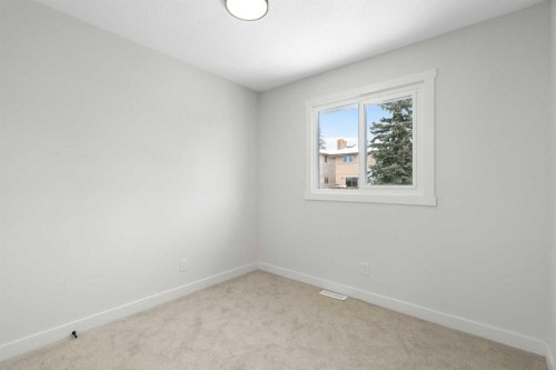 24 Hawkwood Crescent Nw, Calgary, AB - Indoor Photo Showing Other Room