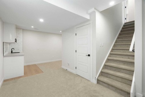 24 Hawkwood Crescent Nw, Calgary, AB - Indoor Photo Showing Other Room