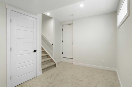 24 Hawkwood Crescent Nw, Calgary, AB - Indoor Photo Showing Other Room