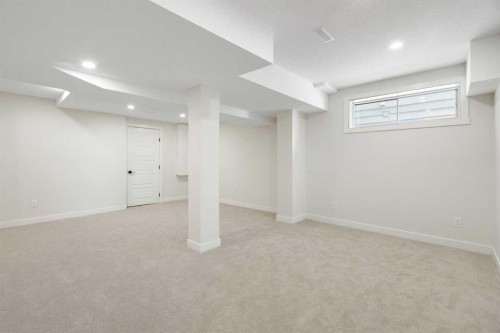 24 Hawkwood Crescent Nw, Calgary, AB - Indoor Photo Showing Basement