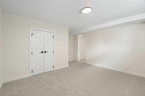 24 Hawkwood Crescent Nw, Calgary, AB - Indoor Photo Showing Other Room