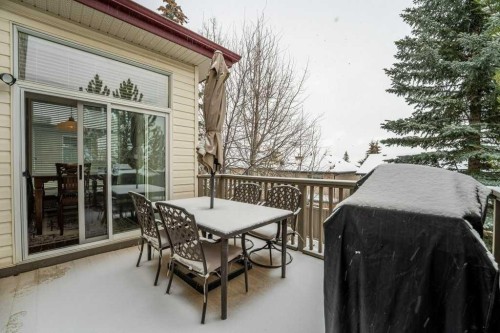 62 Springbluff Boulevard Sw, Calgary, AB - Outdoor With Deck Patio Veranda With Exterior