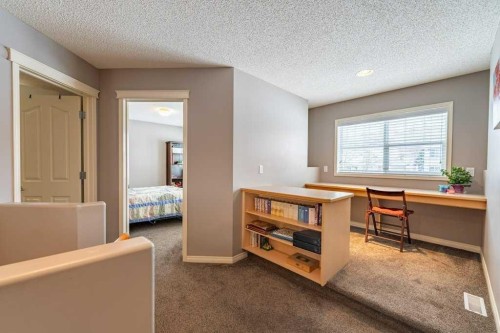 62 Springbluff Boulevard Sw, Calgary, AB - Indoor Photo Showing Other Room