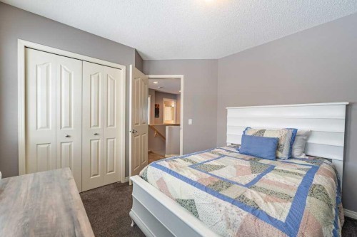 62 Springbluff Boulevard Sw, Calgary, AB - Indoor Photo Showing Bedroom
