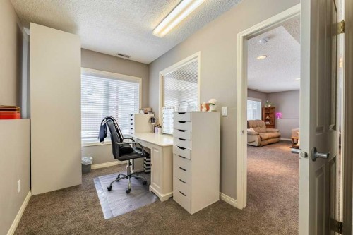 62 Springbluff Boulevard Sw, Calgary, AB - Indoor Photo Showing Office