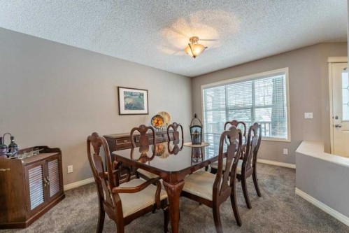 62 Springbluff Boulevard Sw, Calgary, AB - Indoor Photo Showing Dining Room