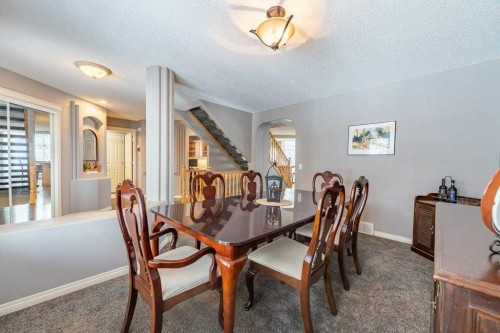 62 Springbluff Boulevard Sw, Calgary, AB - Indoor Photo Showing Dining Room