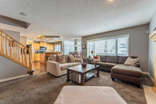 62 Springbluff Boulevard Sw, Calgary, AB - Indoor Photo Showing Living Room