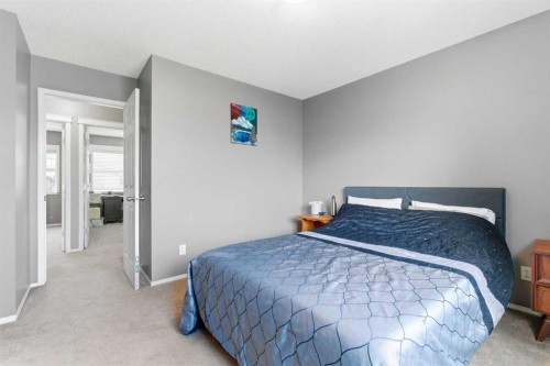 39 Copperfield Terrace Se, Calgary, AB - Indoor Photo Showing Bedroom