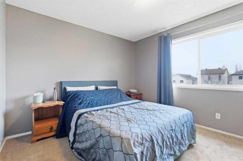 39 Copperfield Terrace Se, Calgary, AB - Indoor Photo Showing Bedroom