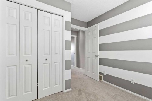 39 Copperfield Terrace Se, Calgary, AB - Indoor Photo Showing Other Room