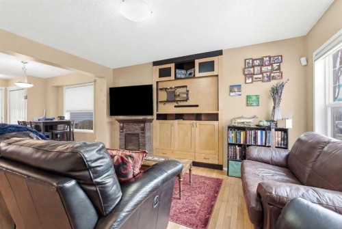 39 Copperfield Terrace Se, Calgary, AB - Indoor Photo Showing Living Room With Fireplace