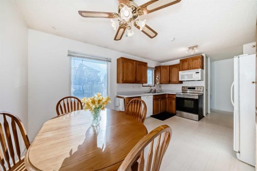 2205 80 Avenue Se, Calgary, AB - Indoor Photo Showing Dining Room