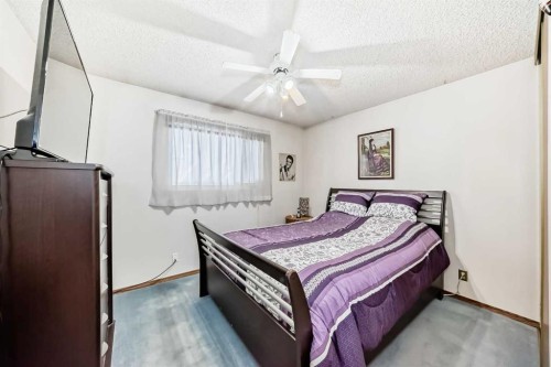 2205 80 Avenue Se, Calgary, AB - Indoor Photo Showing Bedroom