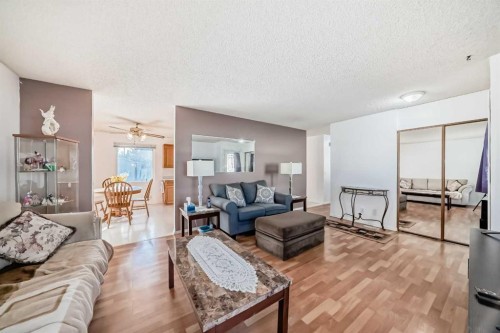 2205 80 Avenue Se, Calgary, AB - Indoor Photo Showing Living Room