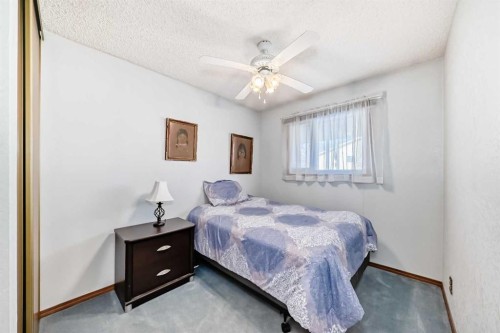2205 80 Avenue Se, Calgary, AB - Indoor Photo Showing Bedroom