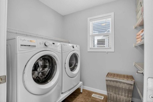 220 Evansborough Way Nw, Calgary, AB - Indoor Photo Showing Laundry Room