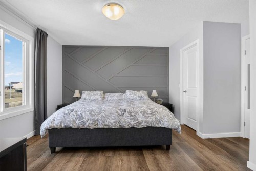 220 Evansborough Way Nw, Calgary, AB - Indoor Photo Showing Bedroom