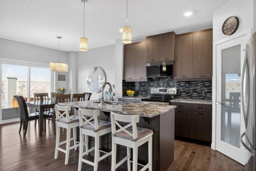 220 Evansborough Way Nw, Calgary, AB - Indoor Photo Showing Kitchen With Upgraded Kitchen