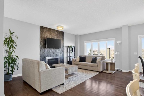 220 Evansborough Way Nw, Calgary, AB - Indoor Photo Showing Living Room With Fireplace
