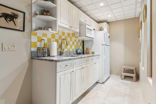 9948 Patton Road Sw, Calgary, AB - Indoor Photo Showing Kitchen
