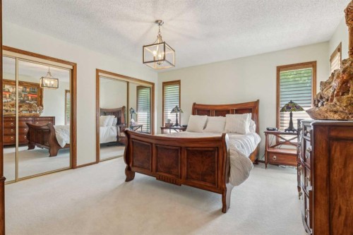 9948 Patton Road Sw, Calgary, AB - Indoor Photo Showing Bedroom