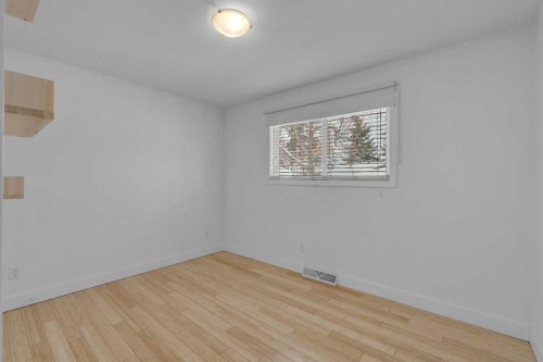 113 Langton Drive Sw, Calgary, AB - Indoor Photo Showing Other Room