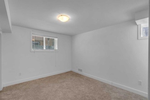 113 Langton Drive Sw, Calgary, AB - Indoor Photo Showing Other Room