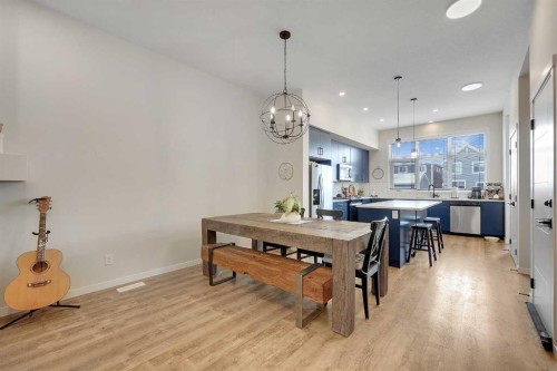 175 Magnolia Way Se, Calgary, AB - Indoor Photo Showing Dining Room
