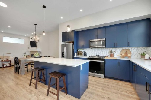 175 Magnolia Way Se, Calgary, AB - Indoor Photo Showing Kitchen With Upgraded Kitchen