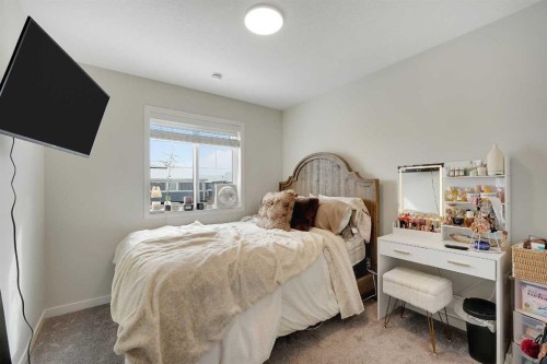 175 Magnolia Way Se, Calgary, AB - Indoor Photo Showing Bedroom