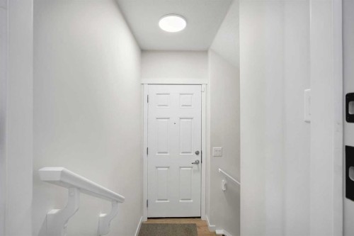 175 Magnolia Way Se, Calgary, AB - Indoor Photo Showing Other Room