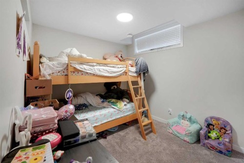 175 Magnolia Way Se, Calgary, AB - Indoor Photo Showing Bedroom