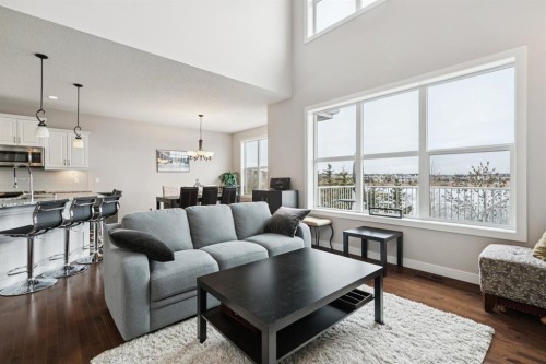 248 Copperpond Circle Se, Calgary, AB - Indoor Photo Showing Living Room