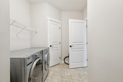 248 Copperpond Circle Se, Calgary, AB - Indoor Photo Showing Laundry Room
