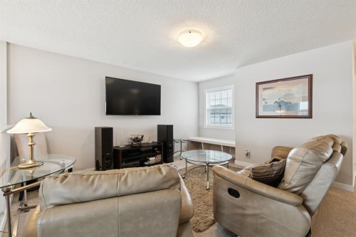 248 Copperpond Circle Se, Calgary, AB - Indoor Photo Showing Living Room