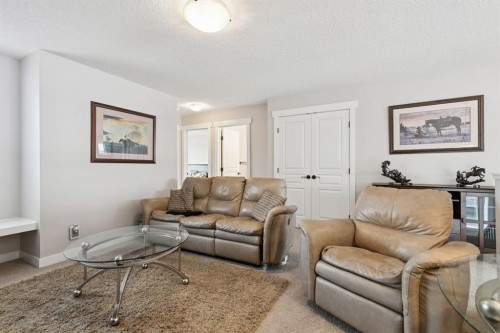 248 Copperpond Circle Se, Calgary, AB - Indoor Photo Showing Living Room