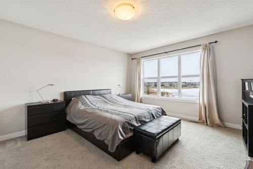 248 Copperpond Circle Se, Calgary, AB - Indoor Photo Showing Bedroom