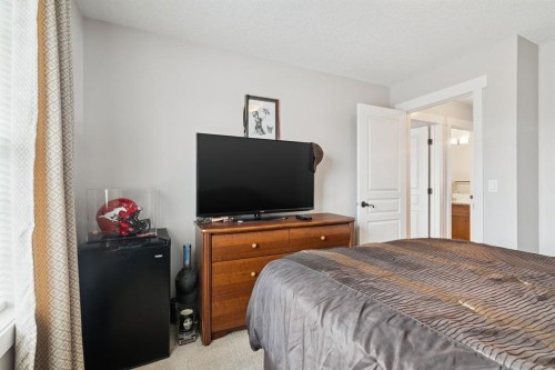 248 Copperpond Circle Se, Calgary, AB - Indoor Photo Showing Bedroom