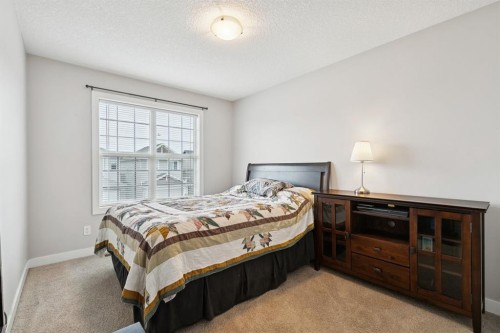 248 Copperpond Circle Se, Calgary, AB - Indoor Photo Showing Bedroom