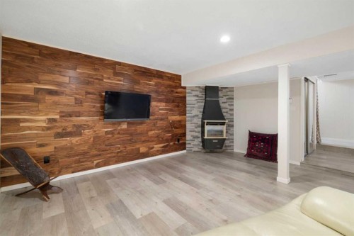 3511 Lakeside Crescent Sw, Calgary, AB - Indoor With Fireplace