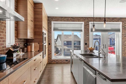 82 Cranbrook Crescent Se, Calgary, AB - Indoor Photo Showing Kitchen With Double Sink With Upgraded Kitchen