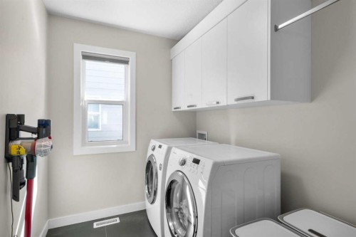 82 Cranbrook Crescent Se, Calgary, AB - Indoor Photo Showing Laundry Room